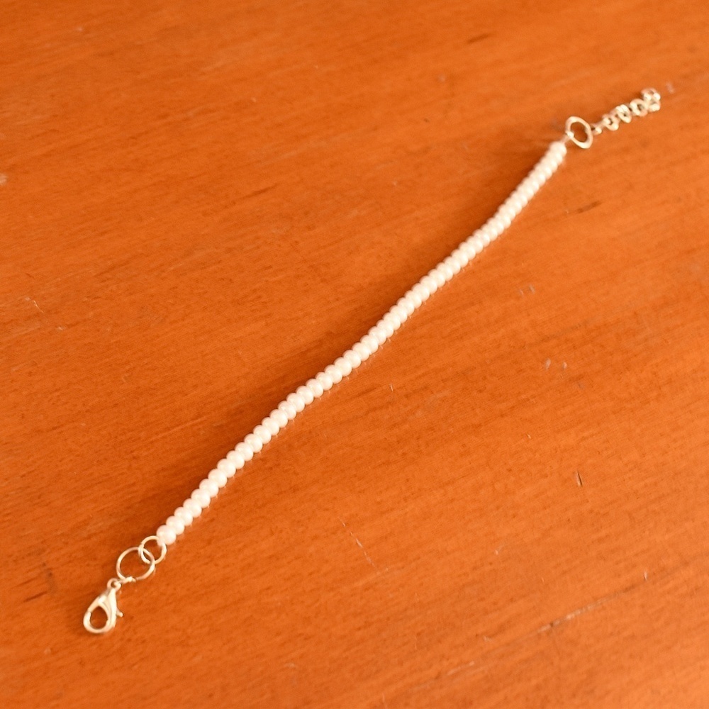 2/$20 Delicate Ivory Beaded Bracelet - Picture 2 of 2